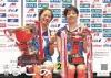 第74回全日本総合バドミントン大会で優勝した福島由紀選手と廣田彩花選手が、優勝カップと金メダルを手に持って笑顔で写っている写真